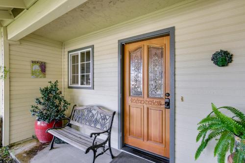 a wooden door on a house with a bench at about 3 Mi to Dtwn and Chico State NorCal Escape! in Chico
