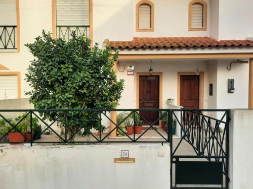 a house with a staircase in front of it at Santo Antonio 2 in Alenquer