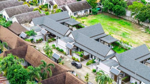 an overhead view of a house with houses at summer stay pool villa in Ban Na Bon