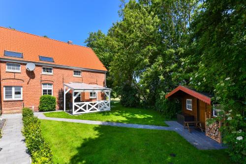 En have udenfor Ferienwohnung Landleben am Meer