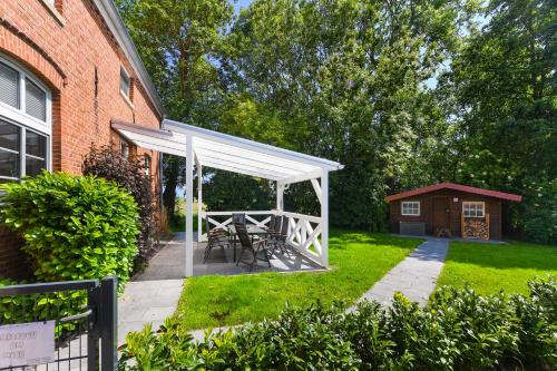 En have udenfor Ferienwohnung Landleben am Meer