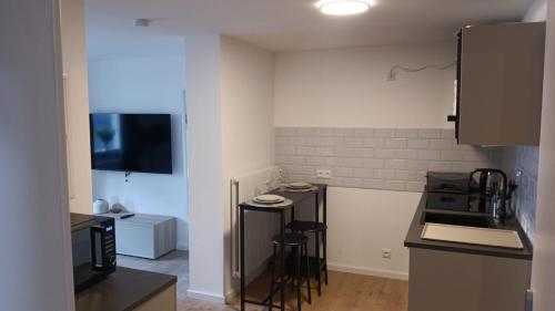 Η κουζίνα ή μικρή κουζίνα στο Apartment - Wohnung Bad Pyrmont