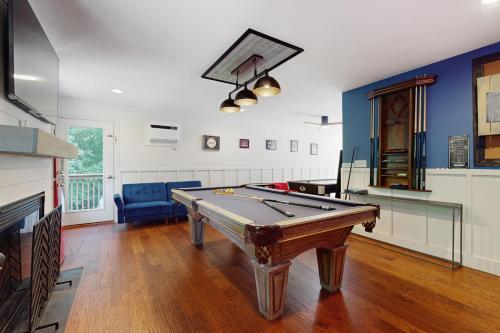 a living room with a pool table in it at Serenity Woods Family Retreat in Glen Lord