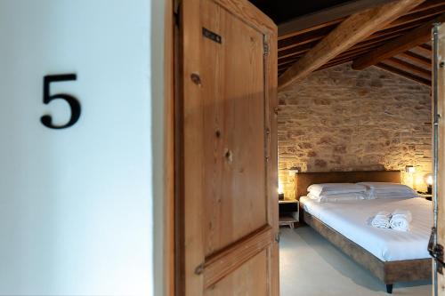 Postel nebo postele na pokoji v ubytování Anfihouse B&B and Apartments