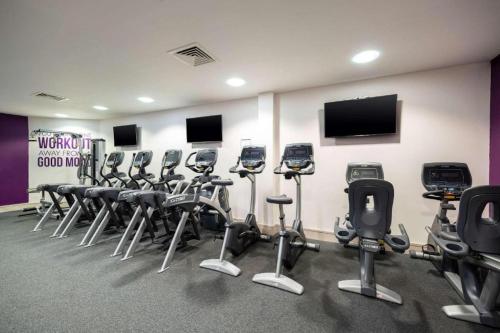 a fitness room with a bunch of exercise equipment at Holiday Inn Newcastle South by IHG in Boldon