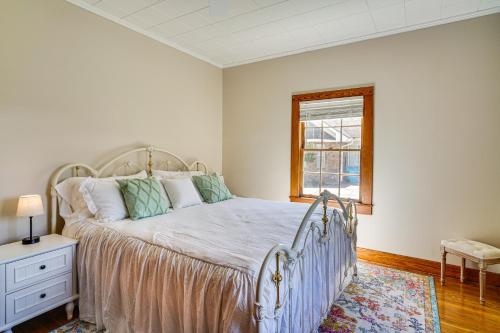a bedroom with a bed and a window at Peaceful Patio, Sunroom Pet-Friendly Baldwin Home in Franklin