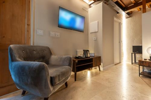 TV a/nebo společenská místnost v ubytování Anfihouse B&B and Apartments