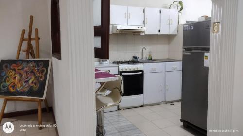 Cuina o zona de cuina de Confortable Apartamento