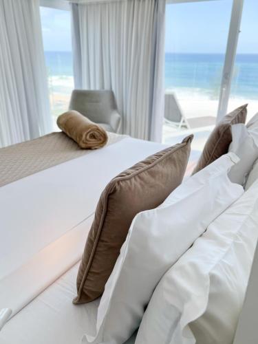 Ein Bett oder Betten in einem Zimmer der Unterkunft CDesign Hotel