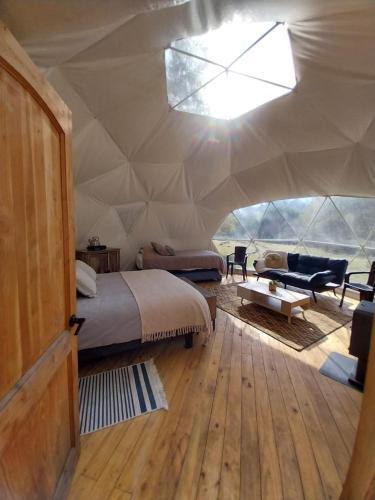 Χώρος καθιστικού στο Domos Glamping Killahue