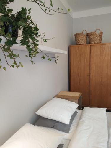 Ένα ή περισσότερα κρεβάτια σε δωμάτιο στο MIKO apartament