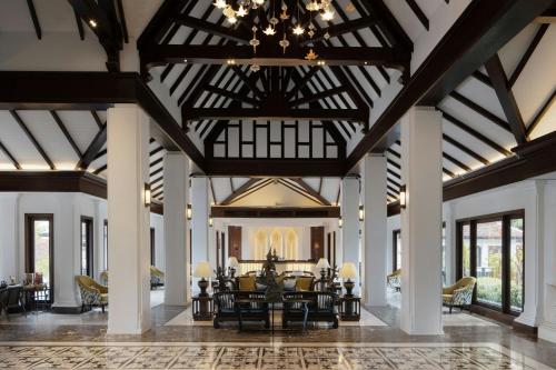 an open living room with a ceiling with beams at Marriott Vacation Club, Khao Lak Beach Resort in Khao Lak