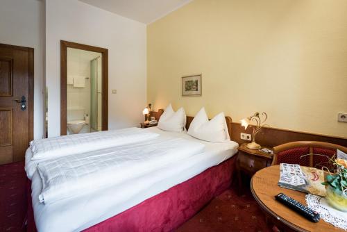 Voodi või voodid majutusasutuse Hotel Plankenhof B&B toas