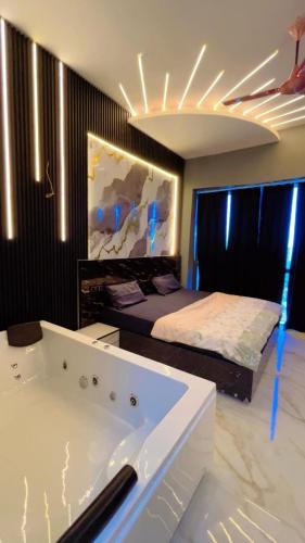 Ένα ή περισσότερα κρεβάτια σε δωμάτιο στο Jacuzzi calms