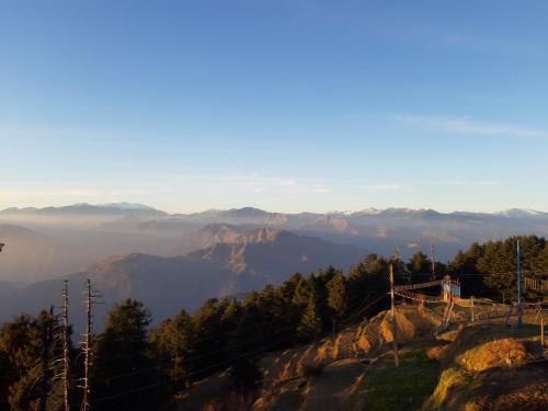 a view from the top of a mountain at Smart Hill Kalatop, Dalhousie in Dalhousie