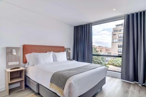 Ένα ή περισσότερα κρεβάτια σε δωμάτιο στο Wynwood House 109