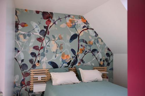 Postel nebo postele na pokoji v ubytování Gîte Ty Familh, maison familiale en pleine nature