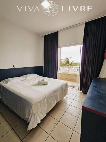 Katil atau katil-katil dalam bilik di Casa a beira mar de Elissandra