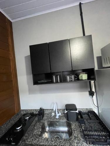 Kuchyň nebo kuchyňský kout v ubytování Microcasa em Itajaí, curta BC e Beto Carrero