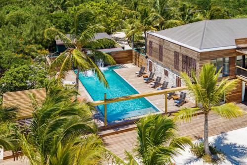 an aerial view of a resort with a swimming pool at Spectacular spacious 8 bedroom family villa in Providenciales