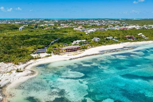 an aerial view of a beach and the ocean at Spectacular spacious 8 bedroom family villa in Providenciales