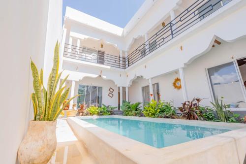 an image of a villa with a swimming pool at Mayssa Villa in Paje