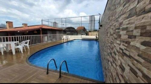 Swimmingpoolen hos eller tæt på Apartamento de 2 quartos