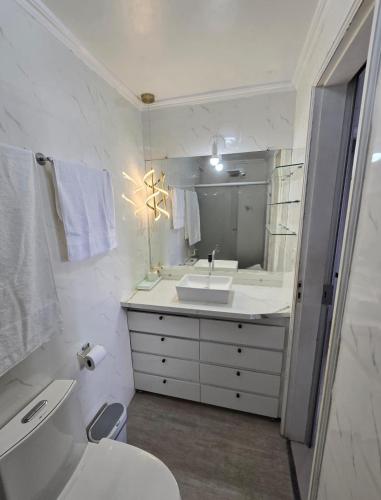 Et badeværelse på Apartamento de 2 quartos