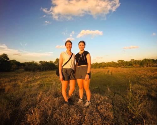 two women posing for a picture in a field at Safaria Lodge Wilpattu in Pahala Maragahawewa