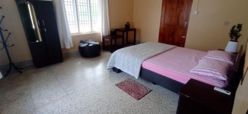 Ένα ή περισσότερα κρεβάτια σε δωμάτιο στο Perch by the sea 2