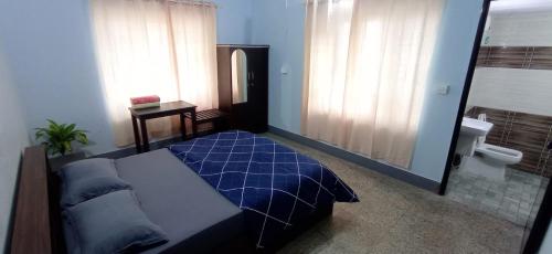 Ένα ή περισσότερα κρεβάτια σε δωμάτιο στο Perch by the sea 2