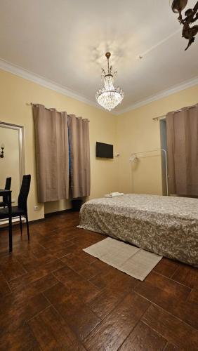 Postel nebo postele na pokoji v ubytování PALAZZO Sintra GH