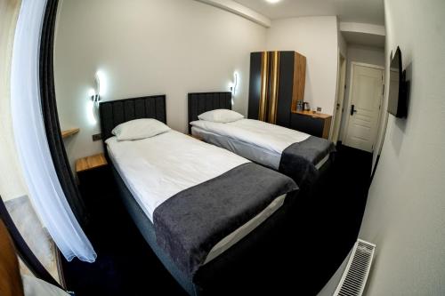 Кровать или кровати в номере Hotel Urban Bliss