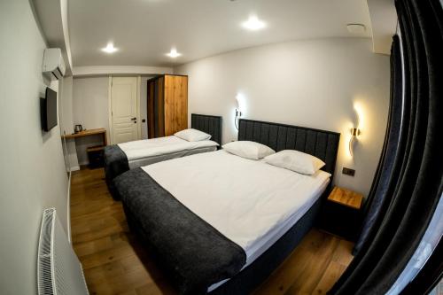 Кровать или кровати в номере Hotel Urban Bliss