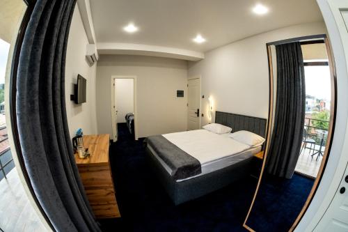 Кровать или кровати в номере Hotel Urban Bliss