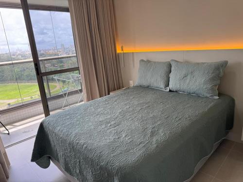 Postel nebo postele na pokoji v ubytování Beach Class Salvador