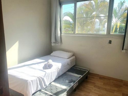 Ένα ή περισσότερα κρεβάτια σε δωμάτιο στο 2 bedroom apartment in Itaparica beach