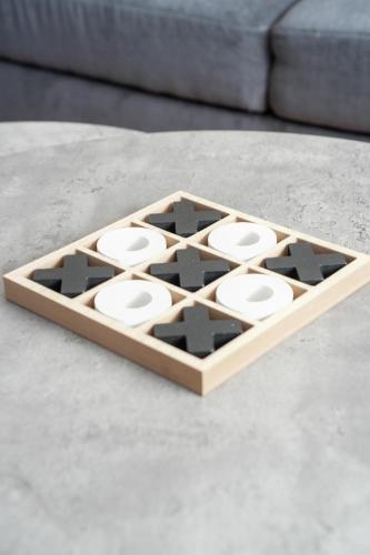 a wooden board game on top of a table at Cliffburn House in Arbroath