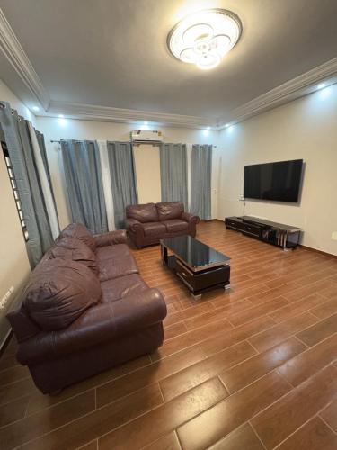 Una televisión o centro de entretenimiento en Appartement TK