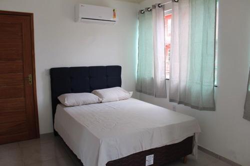 Ένα ή περισσότερα κρεβάτια σε δωμάτιο στο Apartamento Chermont