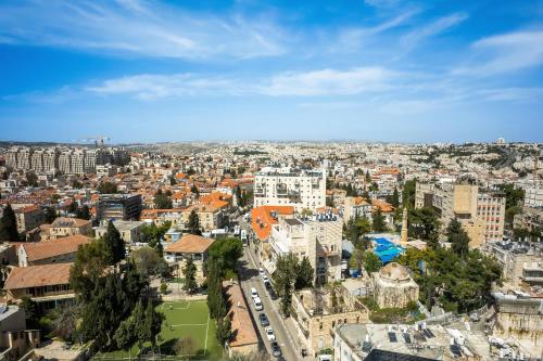 an aerial view of a city with buildings at MR savyon view 2BR with balcony in Jerusalem