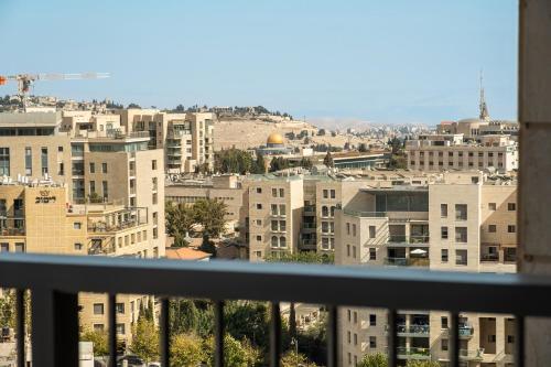 a view of a city from a balcony at MR savyon view 2BR with balcony in Jerusalem