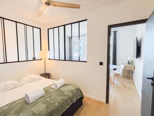 Postel nebo postele na pokoji v ubytování 2 pièces Cannes Le Gallia