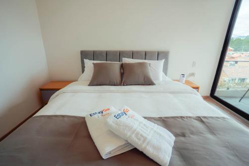 Postel nebo postele na pokoji v ubytování Estay Go Terrazza Suite