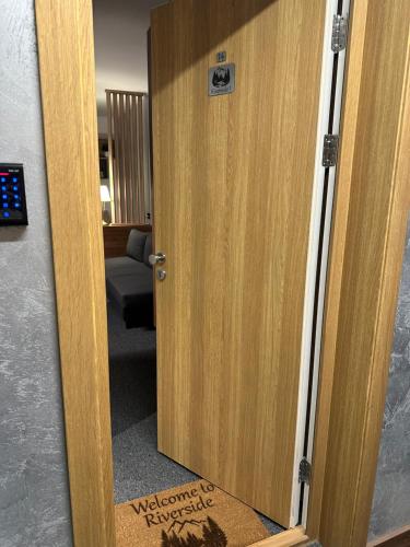 Кровать или кровати в номере Riverside Apartmani Kopaonik