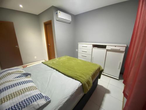 Katil atau katil-katil dalam bilik di Apartamento Edificio Vitta Home