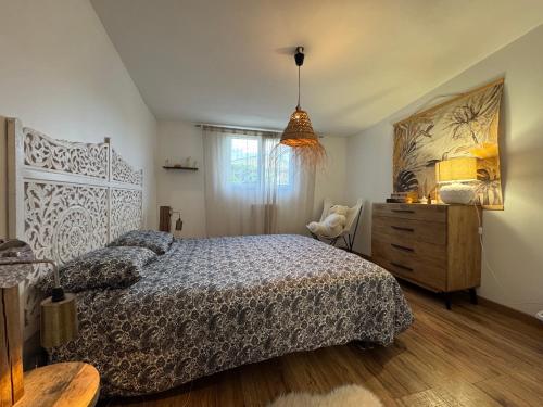 En eller flere senge i et værelse på LUrban Garden - 6pers - Jardin - Circuit Bugatti