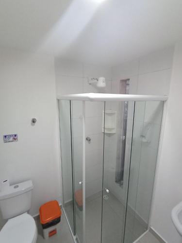 a bathroom with a shower and a toilet at WeStay Nova Cidade in São Paulo