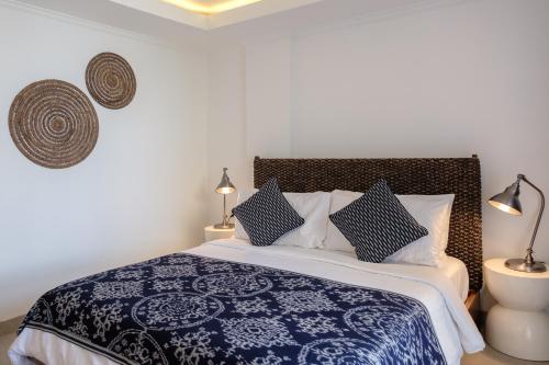 Ibus Beach Hotelにあるベッド