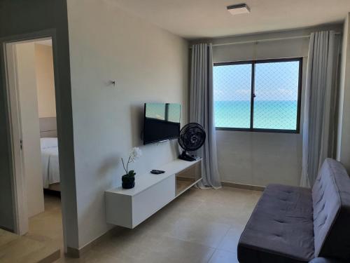 TV a/nebo společenská místnost v ubytování Apartamento 02 quartos completo, BEIRA-MAR com piscina